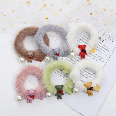 China Attractive Design/Plush Hair Elastic Rope Elastic Bands Premium Quality Plush Solid Color Hair Scrunchies Cartoon Simple Hairy Bear Hair Bands for sale