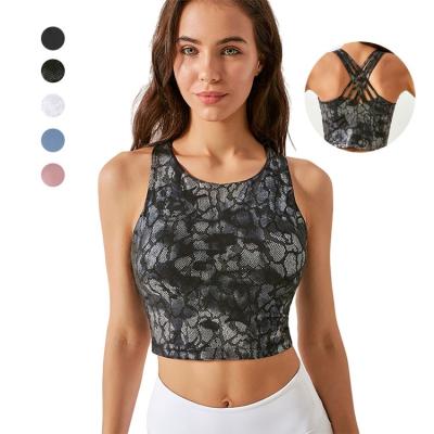 China Breathable cross beauty back lift up high impact sports bra fixed high stretch padded woman sports bra for sale