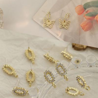 China Fashion Cute Small Bling Alloy Rhinestone Stud Earrings Mask Pin Stud Earring With Loop For Women Fashion Jewelry for sale