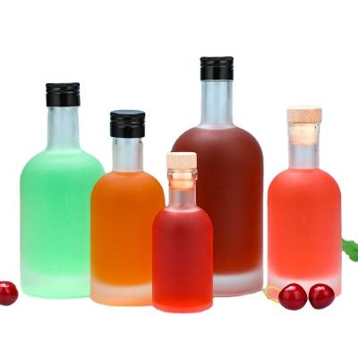 China Wholesale 200ml 375ml 500ml 750ml 1L Empty Round Clear Flint Glass Liquor Wine Vodka Tequila Beverage Bottles With Cork for sale