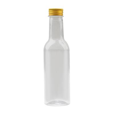 China Mini Beverage Size Liquor Bottle 50ml Juice Wine Glass Drinking Coffee Bottle With Airtight Lid for sale