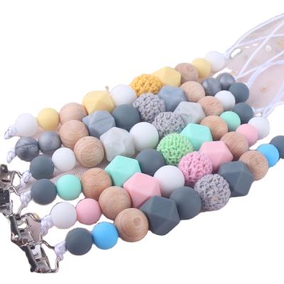 China wholesale 100%food grade silicone Teether new style baby beech wood silicone pacifier chain Teether toys silicone pacifier Anti-drop chain for sale