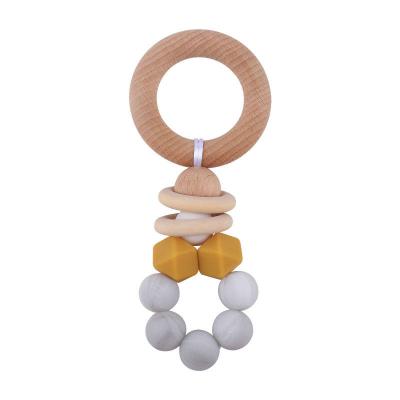 China Wooden Teeth Ring Baby Teeth Toy Wholesale Sensory Toy New Eco-friendly Organic Green Soft Silicone Baby Teether Bpa Free for sale