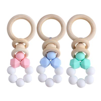 China Toy Hot Selling New Soft Baby Learning Creative Wooden Diy Ring Tasteless Teether Baby Teething Toy for sale