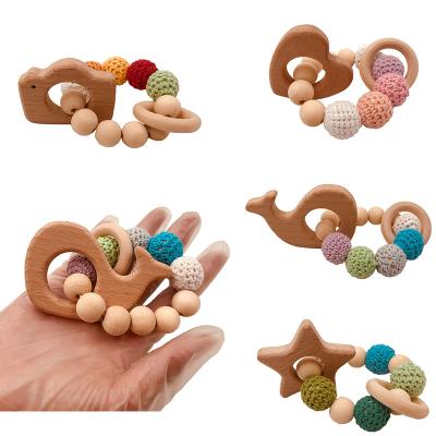 China 100% New Eco-Friendly Baby Teether Bracelets For Newborn Handmade Animal Teeth Ring Knitted Rattles Baby WoodenToy Crochet Beads Beech Wood for sale