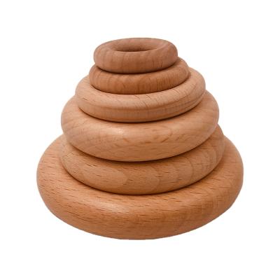 China 2021 Selling Toy Beech Wooden Baby Ring DIY Baby Molars Jewelry Accessories 25mm-70mm Inflatable Hot Wooden Molars Ring Bpa Free Wooden Ring for sale