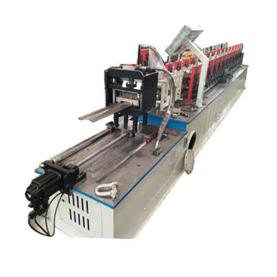 China Full Automatic Factory Shutter Door Roll Forming Machine Rolling Shutter Panel Machine Price for sale