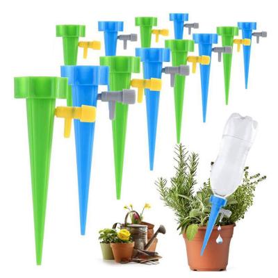 China Spike Plant Flower Cone Garden Irrigation Self Watering Plant Device Automatic Irrigation Flow Device With Drink Bottle for sale