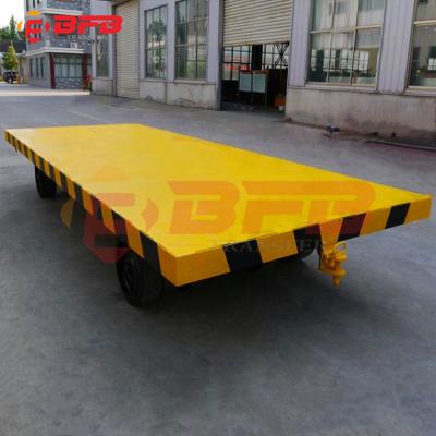 China Industrial Sized With Solid Tire 30 Ton Low Bed Flatbed Trailer Platform Truck for sale