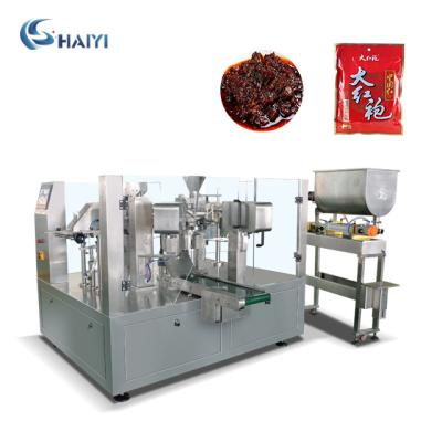 China Full automatic proformed food jar sauce peanut butter pouch ginger garlic paste hot filling and packing machine for sale