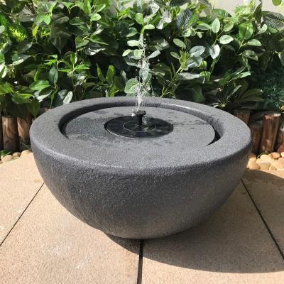 China Modern Feature Black Water Fountain Outdoor Fiber Solar Stone Ornaments Modern Indoor And Outdoor Outdoor Water Feature Garden Decoration Round for sale