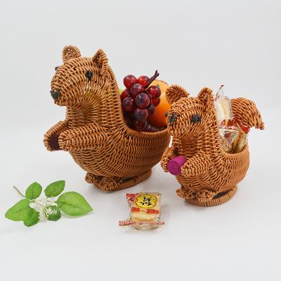 China New viable follow squirrel cartoon rattan fruit basket storage basket creative desktop decoration snack supply basket for sale