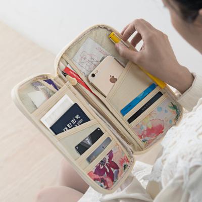 China Travel Bag Factory Direct Sales Handmade Organizer Well Printing Passport Holder Wallet With Wristband Strap for sale