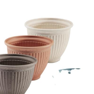 China Contemporary Automatic Self Watering Plant Pot Water Absorbing Flower Pot for sale