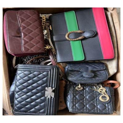 China High quality leather women bags top leather used brand second lady bags bullet handbags wholesale for sale