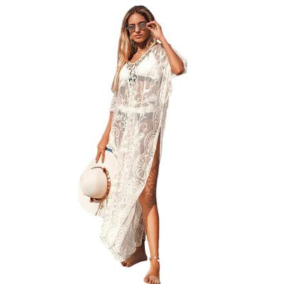 China 2022 New Women's Inner Skin Beach Blouse Crochet Flower Cavity Lace Sunscreen Covered Beach Skirt Breathable Covered Skirt for sale