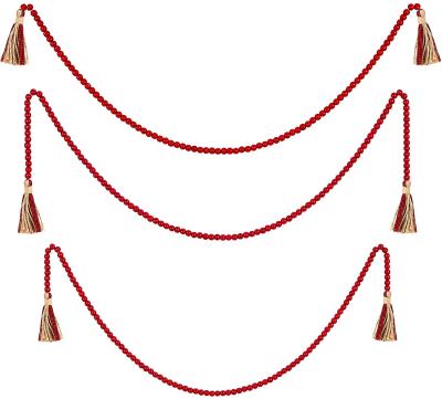 China Europe 3 Pieces Vintage Wooden Bead Valentine's Day Garland Beads Red Wood With Tassels Rustic Bead Garland for sale