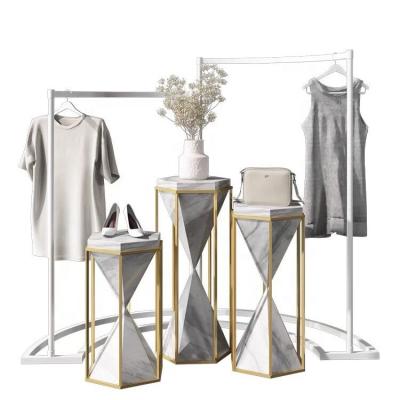 China Eco-friendly Fashion Clothing Store Furniture Ideas Stainless Steel Half Round Clothes Display Rack for sale