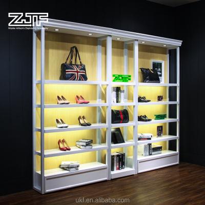 China Eco-friendly Lacquered Multifunctional Display Shoe Shelves Modern Handbag Shop Clothing Display Stand For Sale for sale