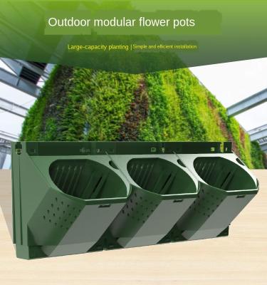 China Self-watering Garden Wall Planter Potted Plant Flower Planter Vertical Wall Plastic Green System Self-watering Vertical Planter for sale