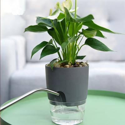 China Separate Indoor Modern Decorative Round Plastic Planter Pot Self Watering Plant Pots For Indoor Plants for sale