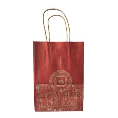 China Recyclable Custom Logo Print Red Gift Shopping Packaging Bags Kraft Paper Bag With Handles for sale