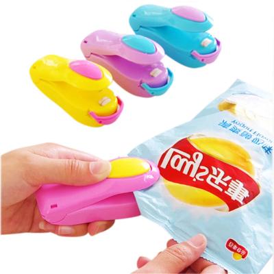 China Mini Handheld Electric Heating Food Snack Sealing Tools Sealed Plastic Pouch Food Packaging Sealed Bag for sale