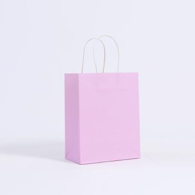 China Fashion Materials Logo Recycled Pink Paper Shopping Bag Custom Recyclable Pattern Eco-friendly Gift Packaging Bag With Handle for sale