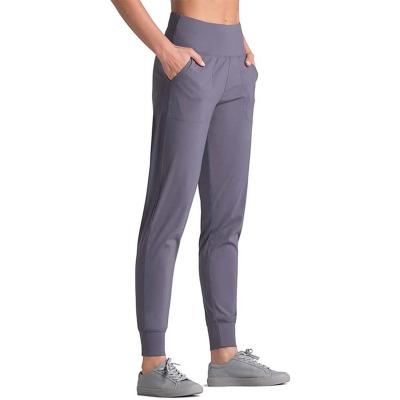 China Breathable High Waist Women Gym Workout Wear Girl Yoga Pants Leggings Sports Joggers Pockets Sport Clothing for sale