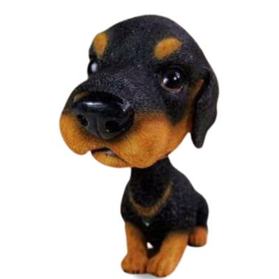 China Europe Resin Animal Flip Memories Gift Puppy Car Head Dash Decoration Nodding Head Doll Anime Miniature Figure Bobblehead Dog for sale