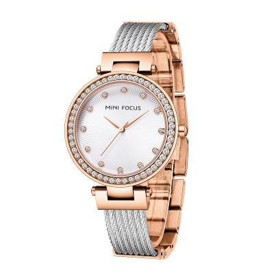 China Water Resistant Mini Focus 0423 Ladies Magnetic Bracelet Diamond Quartz Elegant Luxury Simple Watch for sale