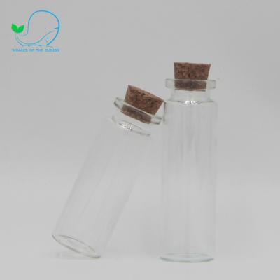 China Promotional Exquisite Stock Mini Bottle Containers Small Glass Jars Vials Recyclable With Cork Stopper Lid for sale