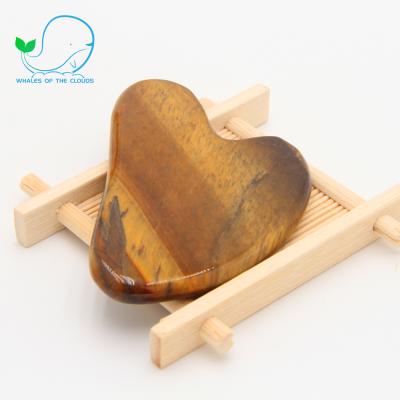 China Health Care Crystal Scraping Massage Tool Natural Body Heart Shape Brown Gua Sha for sale