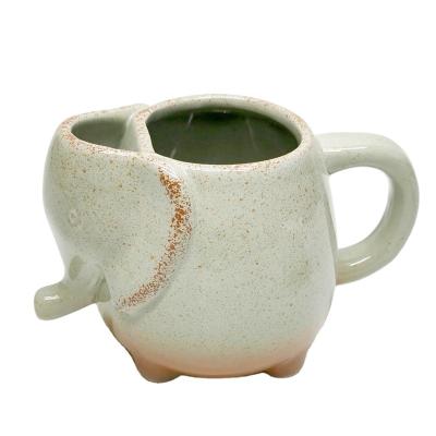 China 2021 Modern FAB Ceramic /cookie, hot sale white and green pocket cup mug with tea bag holder, tea bag holder mug for sale