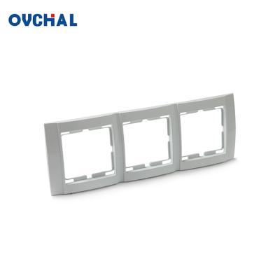 China OUCHI Residential Wall Switch Socket Accessories 3 Strip Lamp Switch Frame Plate for sale