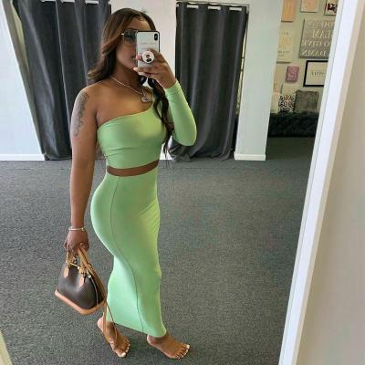 China Hot Selling Anti-wrinkle 2021 Autumn Cheap One-shoulder One-Shoulder Two Piece Set Crop Bag Sexy Hip Top Sleeve Long Skirt for sale