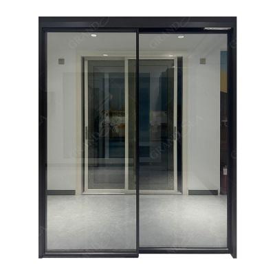 China Heat Insulation Grandsea Black Frame Black Frame Sliding Glass Doors Electric Automatic Steel Double Side Sliding Glass Doors For Houses for sale