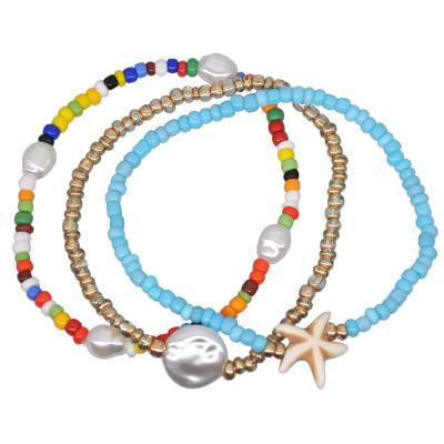 China New Handmade Ethnic Pearl Bracelet Anklet Chain Summer Ethnic Fashion Starfish Bead Bracelet Three Color Rice Bead Bracelet Three Sets for sale