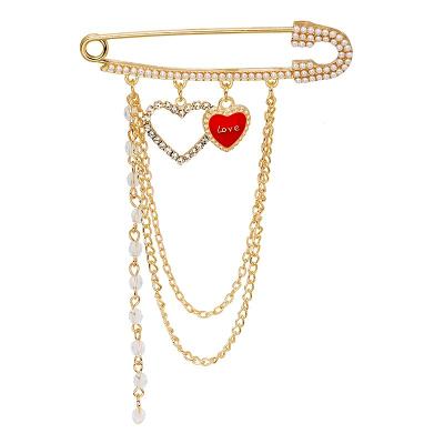 China Fashionable luxury drop-shaped pearl tassel brooch imitation alloy inlaid light luxury style love butterfly accessories for sale