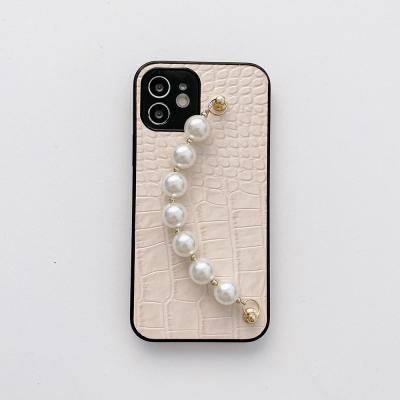 China 2021 New Anti-drop Crocodile Pattern Leather Soft Shell With Pearl Chain For iPhone 12promax Cell Phone Case for sale