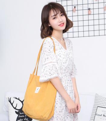 China Large Capacity Women Casual Tote Bag Corduroy Fabric Cross - Body Retail Shopping Bag for sale