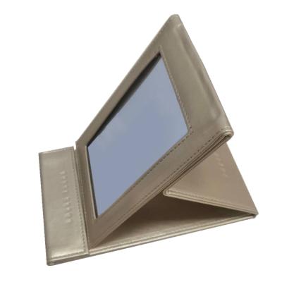 China Non-Specific Handheld Mirror Folding Desktop Makeup Mirrors Soft Touch Hand Mirrors Shape Bag Wall Customized Glass Frame Logo Style Type for sale