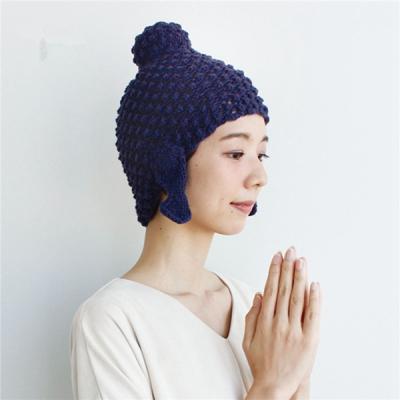 China Autumn and winter single women's Buddha head woolen hat COMMON day knitted ear hat hand weaving hat for sale