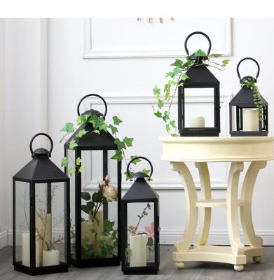 China European Outdoor Glass Lantern Garden Decoration Metal Floor Weddings Style Sconce Model Ornaments Iron Wind Lanterns for sale