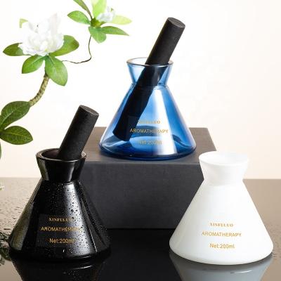 China OEM Decration 200ml Luxury Glass Reed Diffuser Rattan Stick Home Fragrance Diffuser With Essential Oil for sale