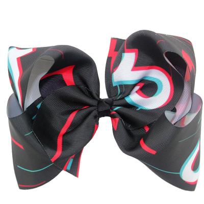 China 8 inch big big tiktok girl boutique hair bows hair band accessories with clip hair accessories for kids for sale