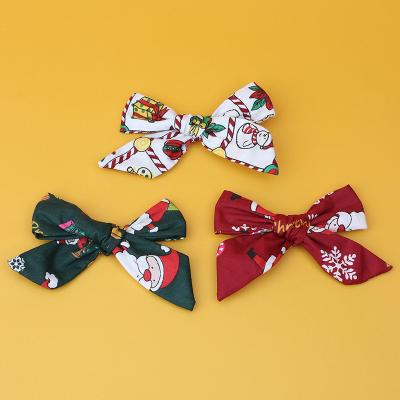 China Cute Lovely New Children's Bowknot Cartoon Christmas Santa Claus Hair Bow Hair Ornament For Girls Children for sale