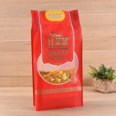 China High quality moisture proof basmati rice packaging plastic bags design with printing empty plastic handle for sale