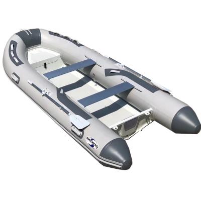 China New Family Entertainment Design Power By Yamaha Figerhlass Inflatable Boat for sale