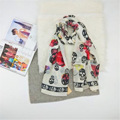 China Decoration gift ZP Korea accessory lady printed new silk shawls velvet satin skull scarf fashionable long shawl for sale